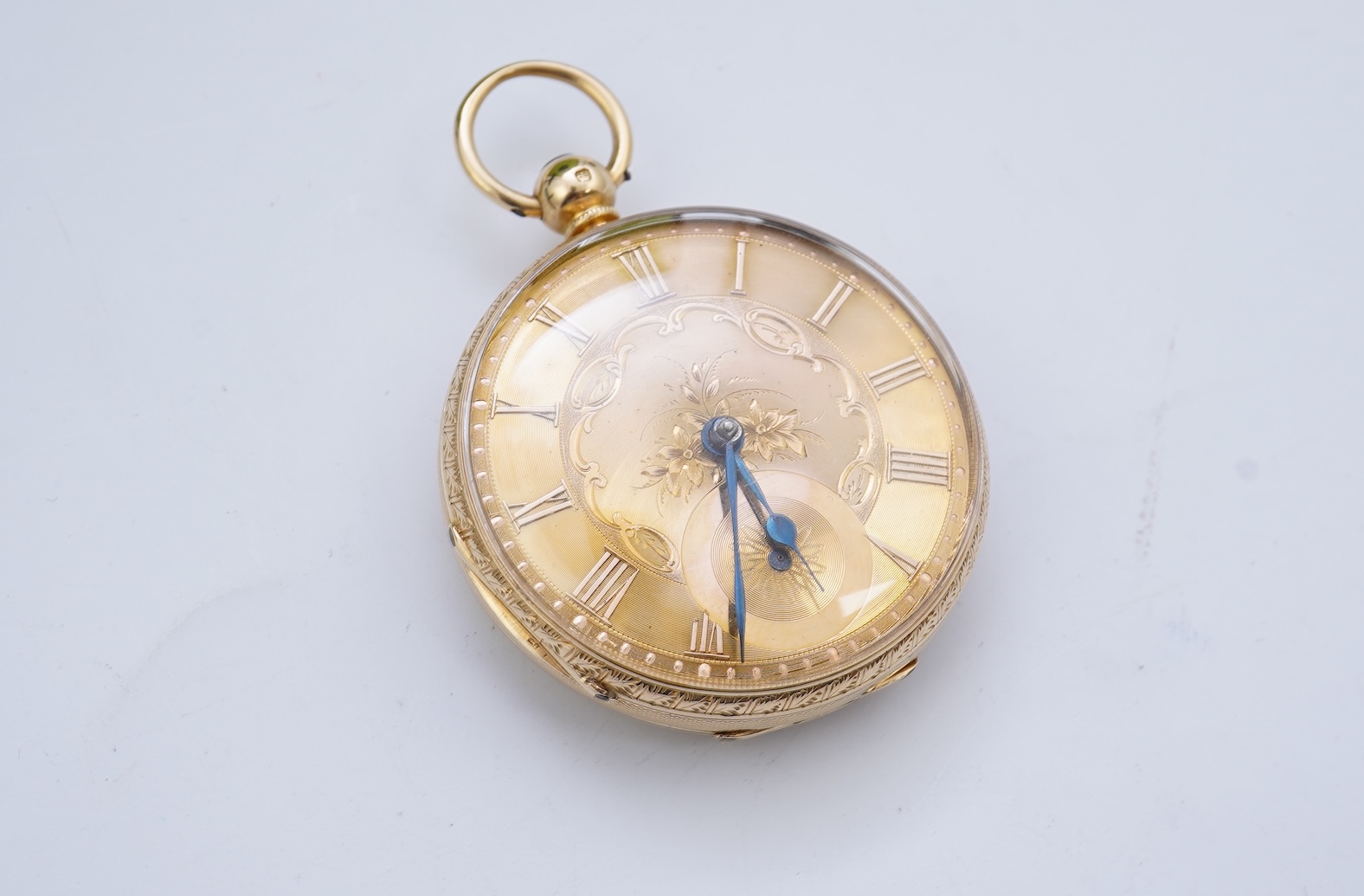 A Victorian engraved 18ct gold open faced key wind pocket watch